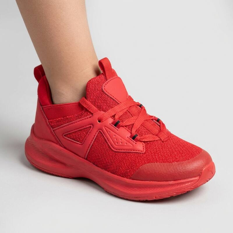 All-red Lastwell sneaker on a child's foot